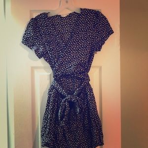 Black wrap romper with star pattern